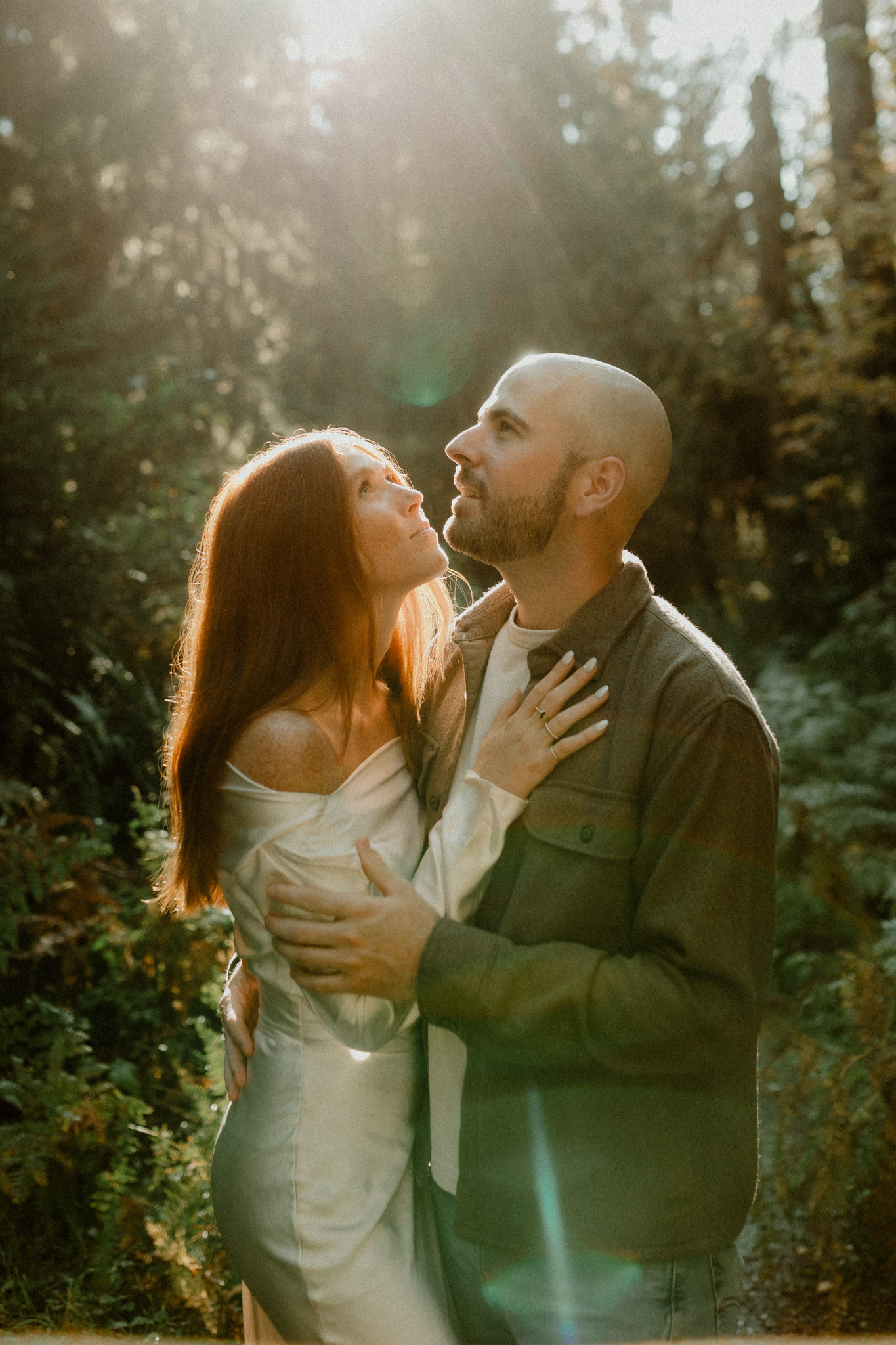 Off-the-shoulder white satin engagement session dress for a PNW forest session
