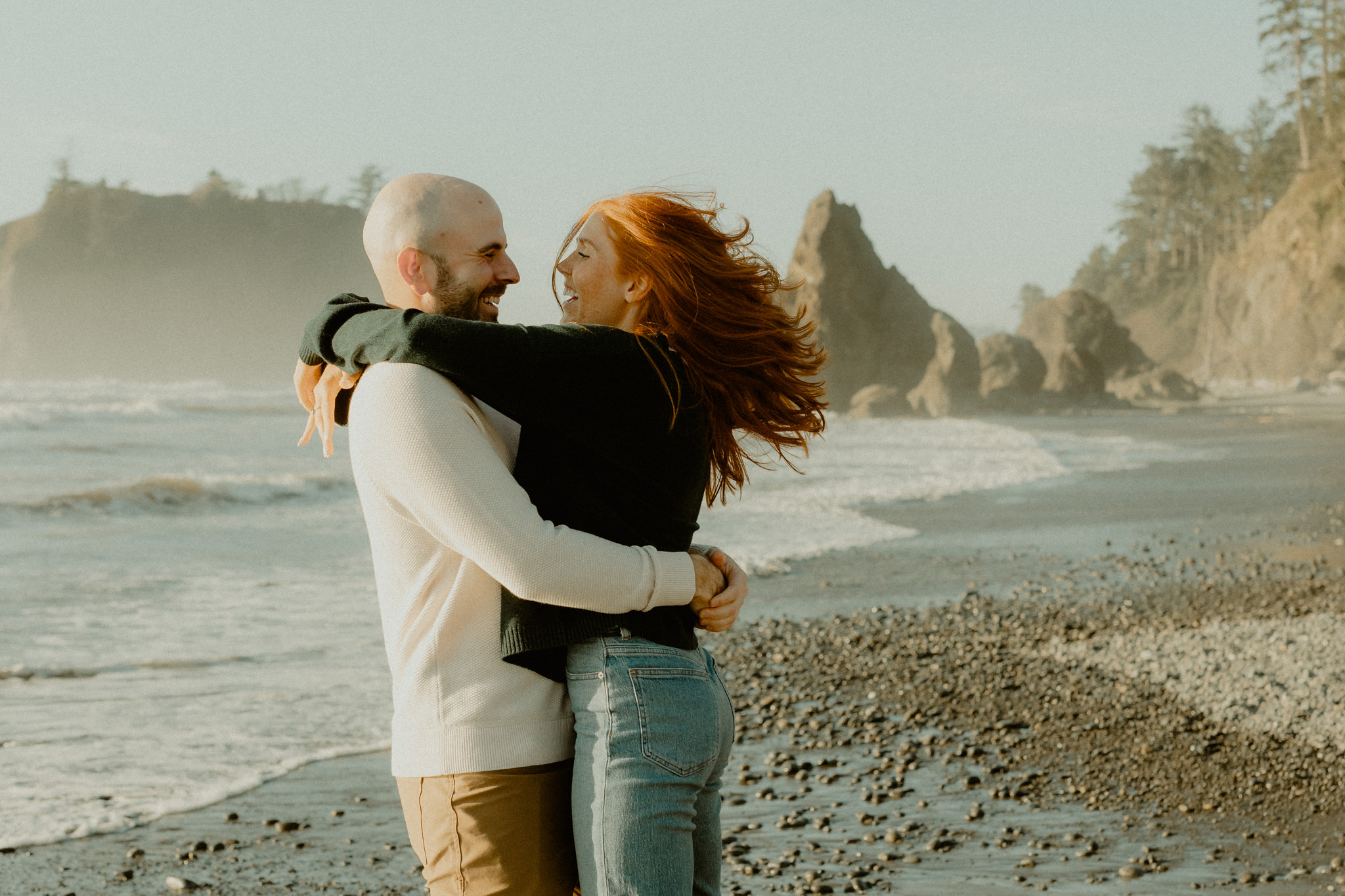 Playful engagement session inspiration at Ruby Beach in Olympic National Park