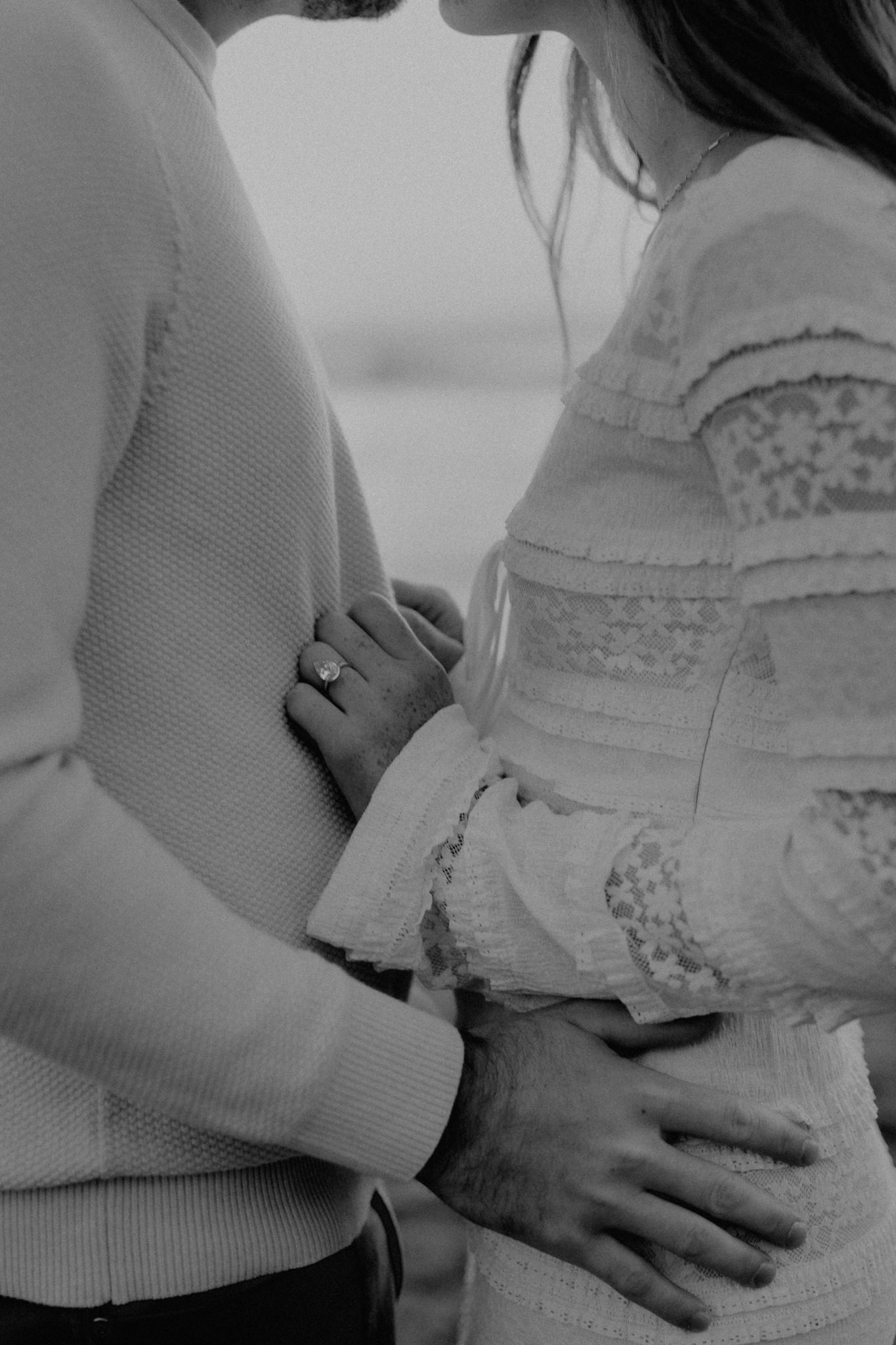 Moody blue hour engagement photos with bride in lace dress