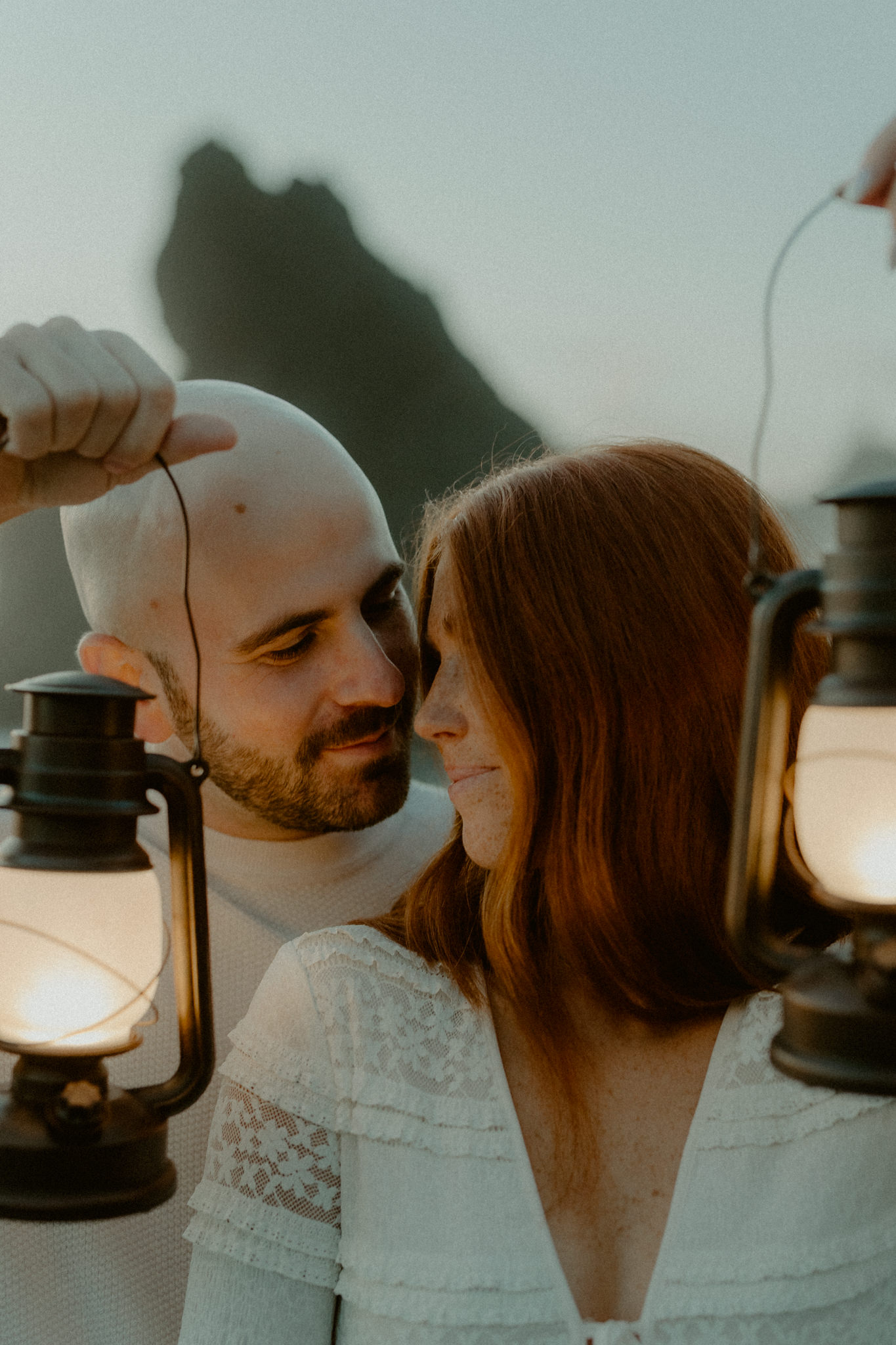 Lantern-lit couples portraits at Ruby Beach during twilight in Forks Washington