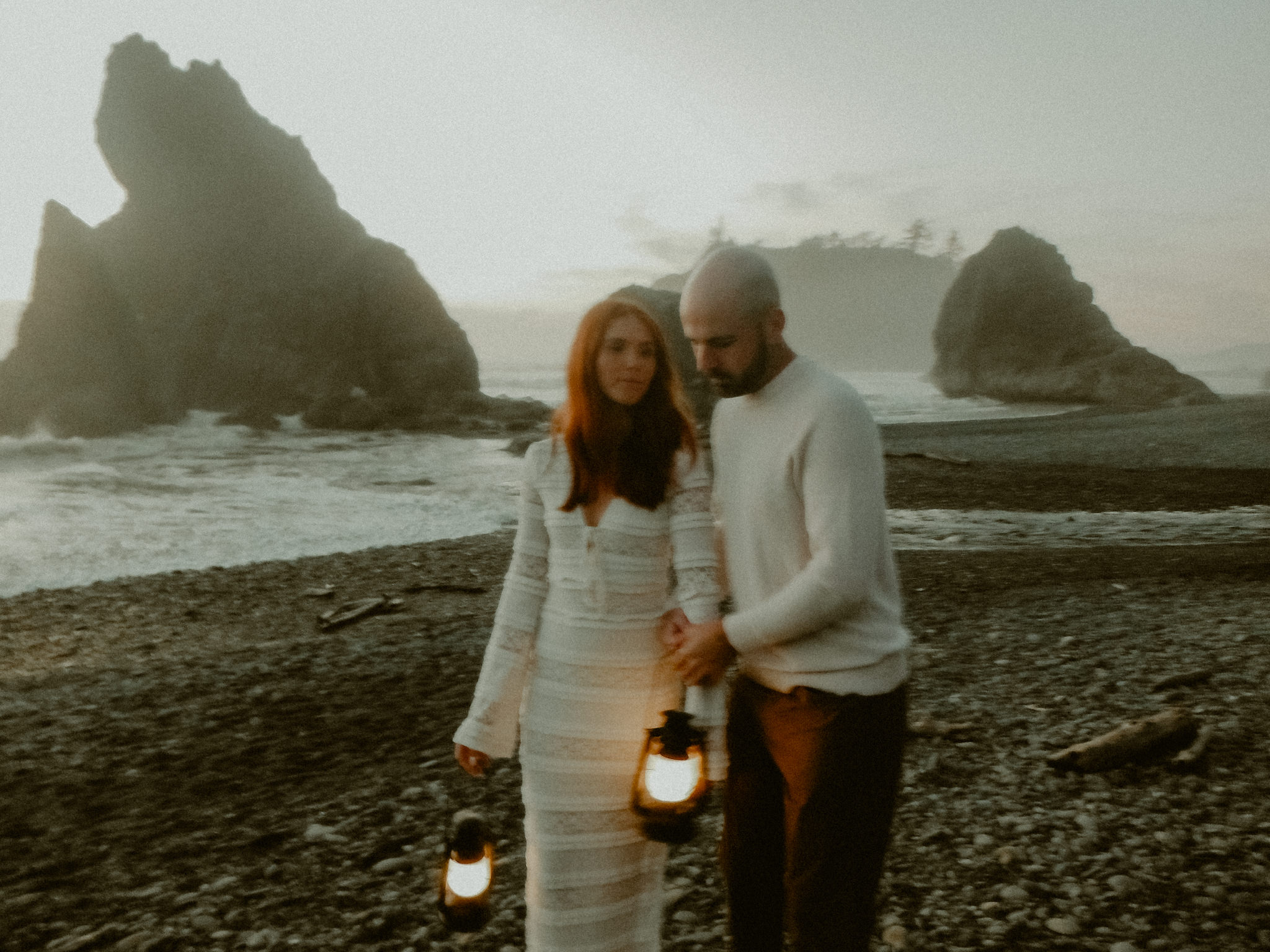 Lantern-lit twilight engagement session at Ruby Beach in Forks Washington